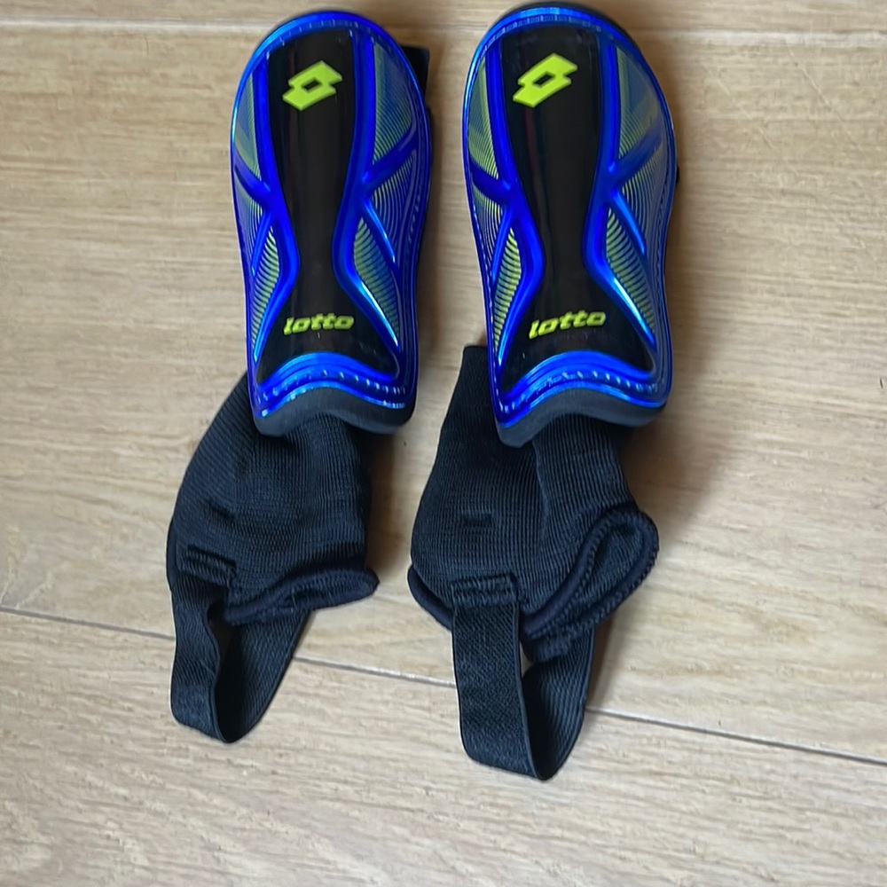 Soccer Shin Guards with stirrups and ankle padding.  Worn only 4 times! Size Sm